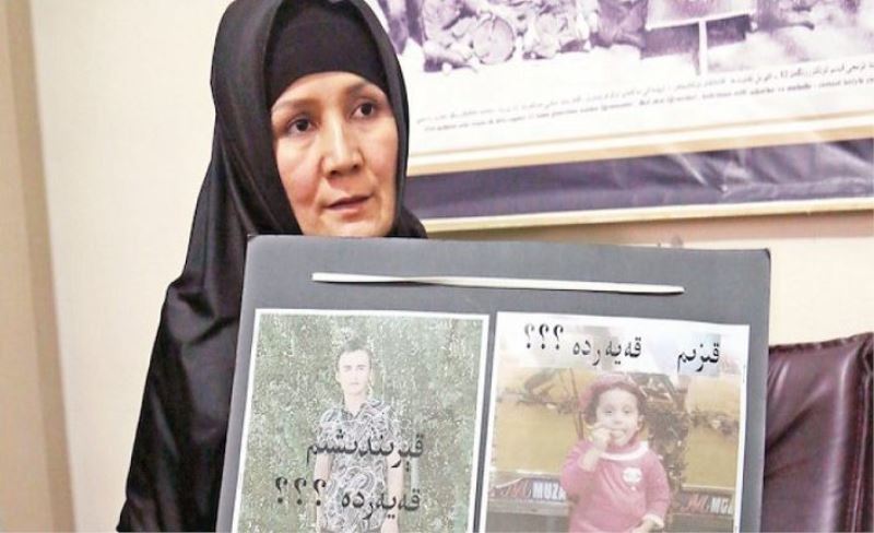 Doğu Türkistanlı Anneye Üçüncü Çocuk Doğurduğu İçin 7 Yıl Hapis