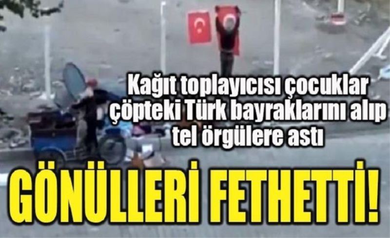 Kağıt toplayıcı çocuk, çöpe atılan Türk bayrağını alıp tel örgülere astı!