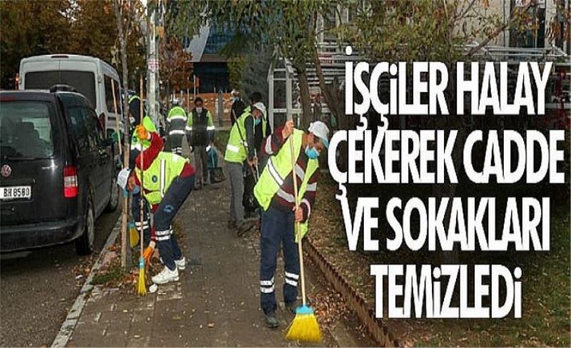 İşçiler halay çekerek cadde ve sokakları temizledi