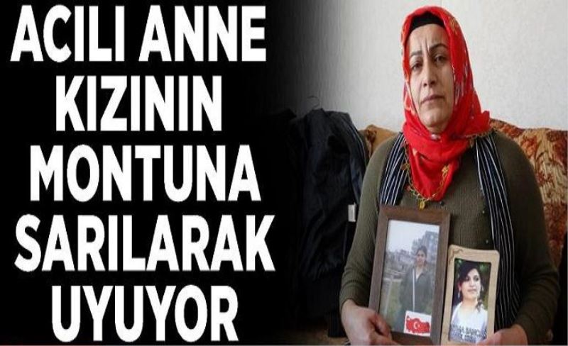 Acılı anne Sancar, kızının montuna sarılarak uyuyor