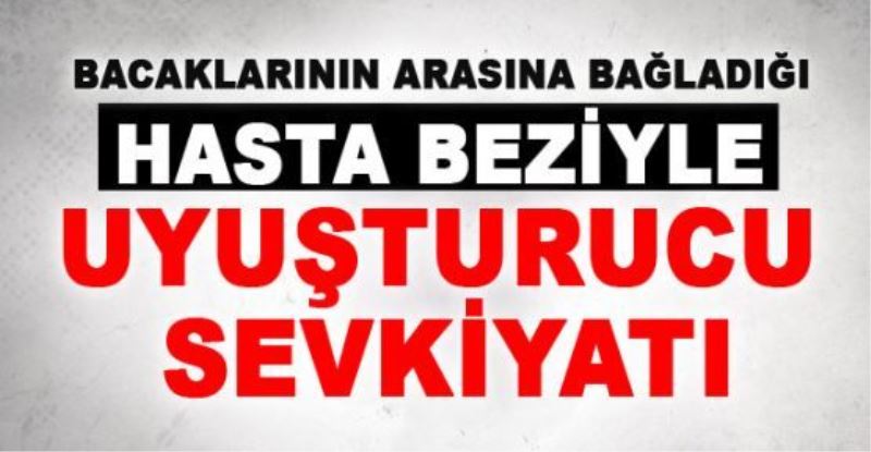 Bacaklarının arasına bağladığı hasta beziyle uyuşturucu sevkiyatı